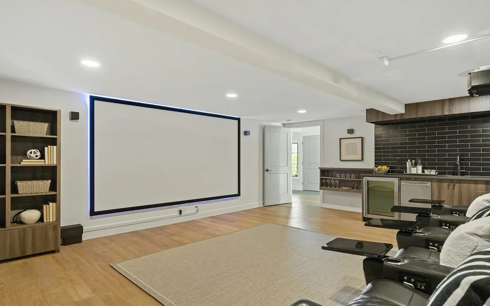 Living room with large projection screen for home theater