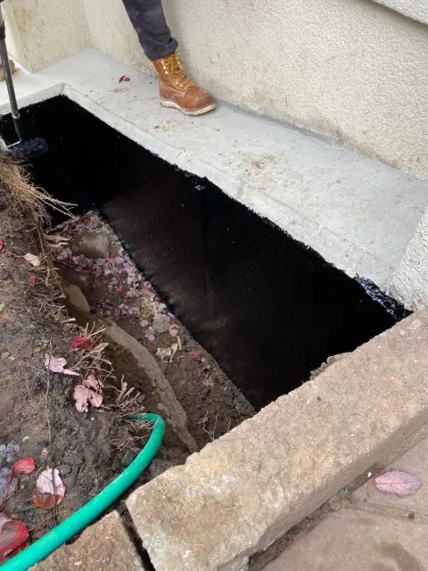Exterior foundation waterproofing membrane applied at a Bergen County home